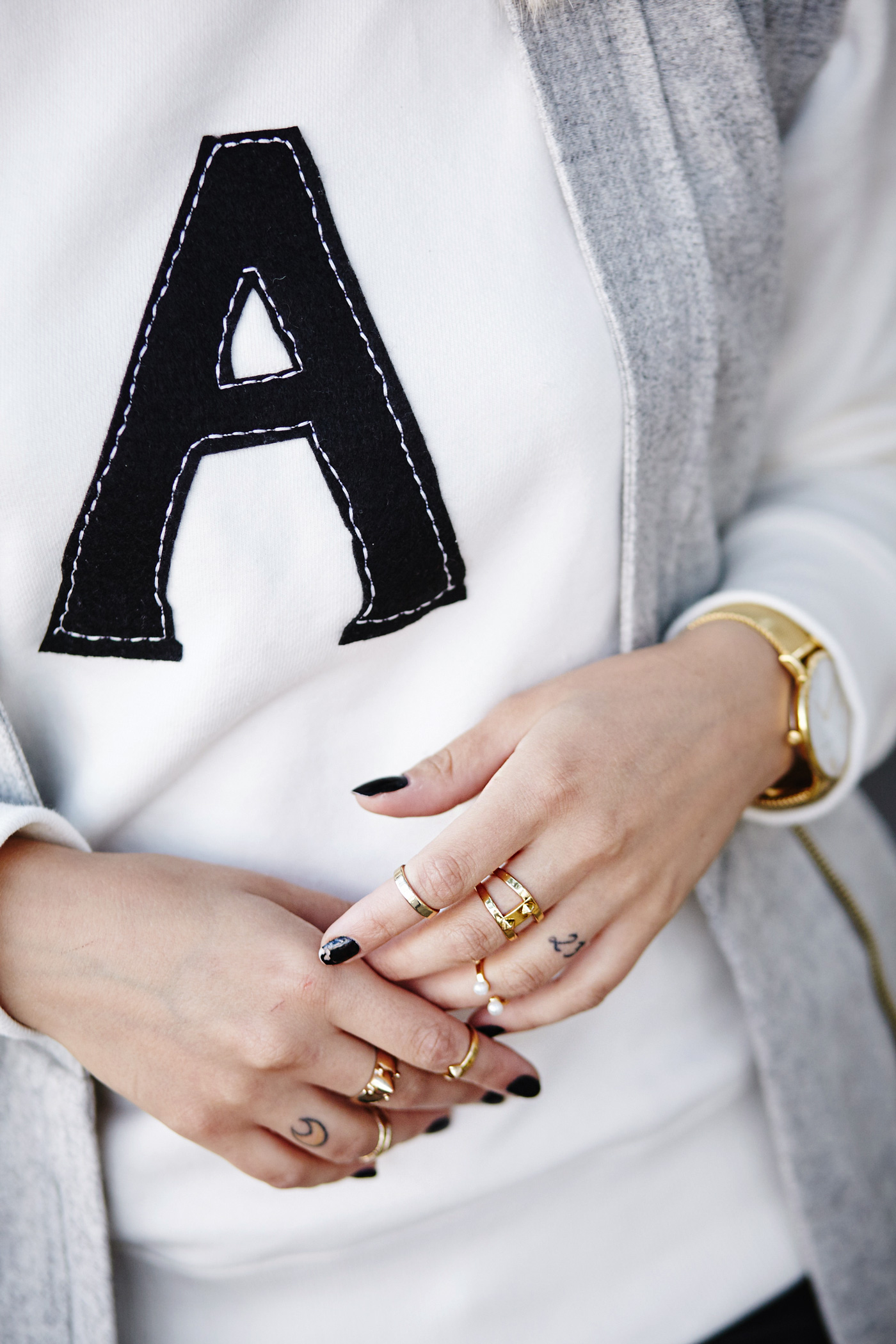Casual College Outfit | Masha Sedgwick is wearing a sweater from Alexa Chung for AG, black leather pants, grey Sonia Rykiel bag and grey Kala vest | Berlin street style