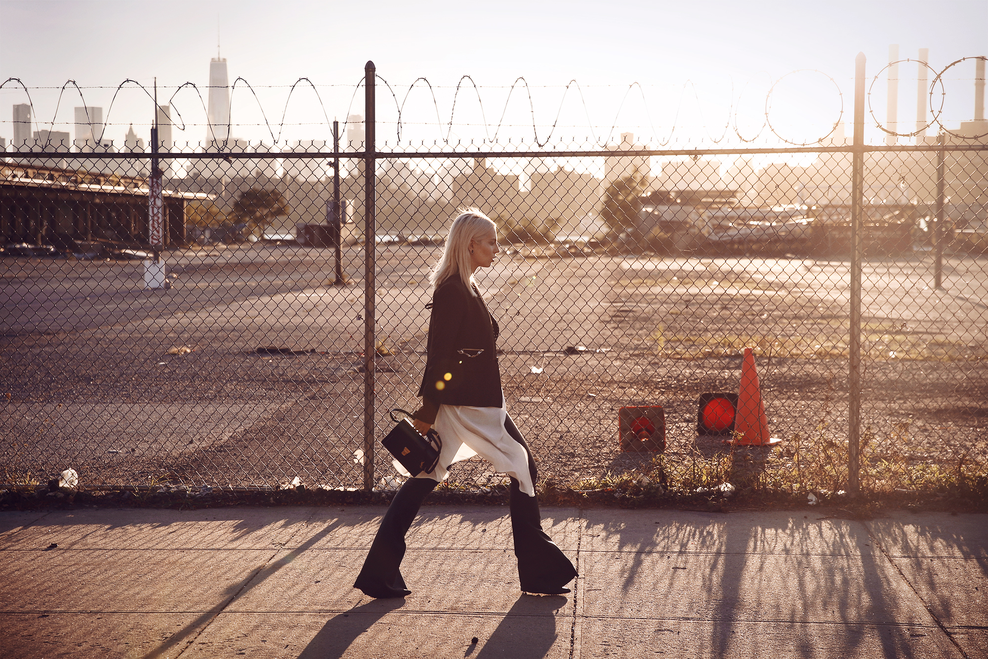 Street style from New York, Williamsburg with Manhattan Skyline via Masha Sedgwick wearing Diesel Black Gold and Saint Laurent