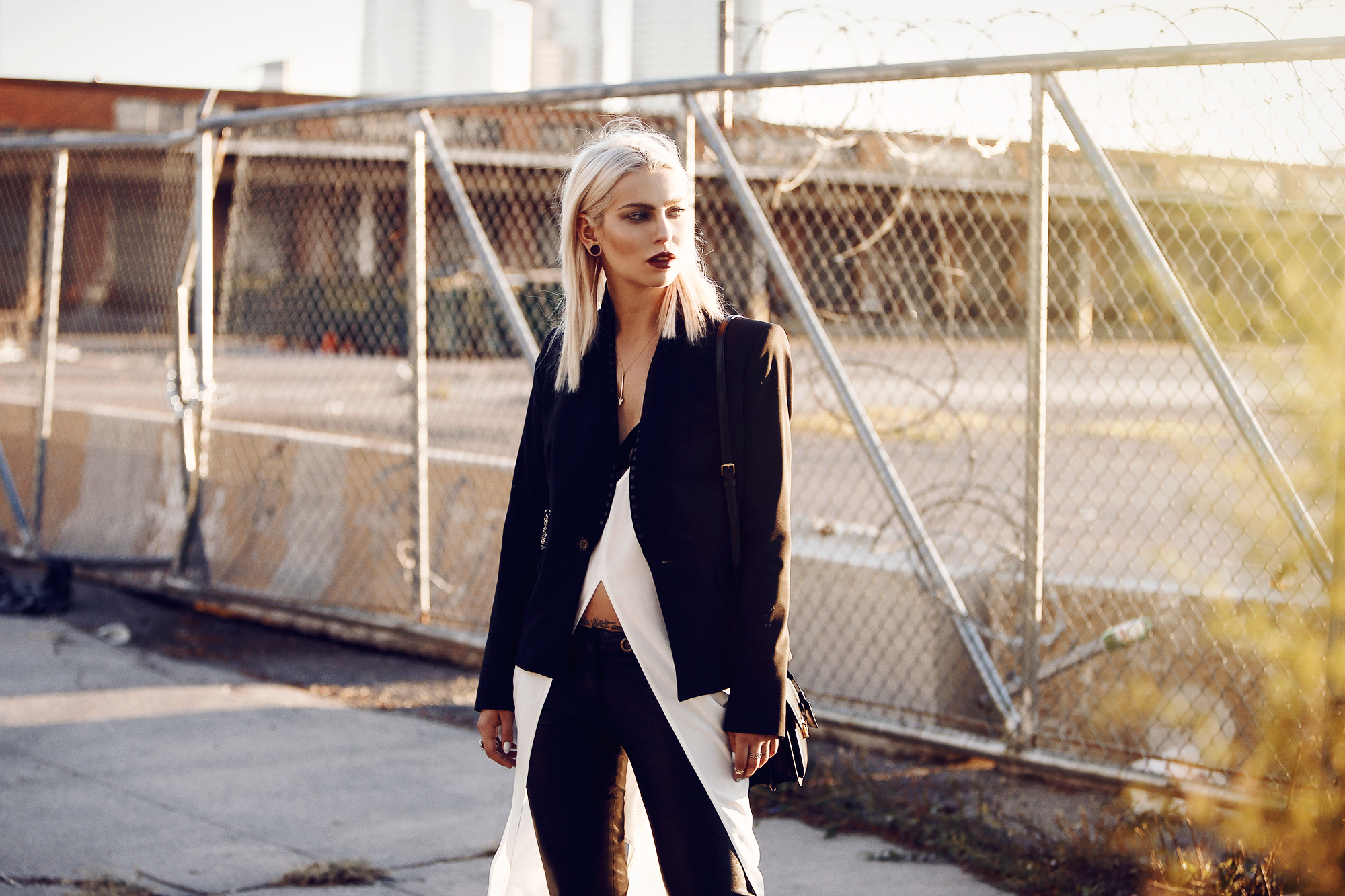Street style from New York, Williamsburg with Manhattan Skyline via Masha Sedgwick wearing Diesel Black Gold and Saint Laurent