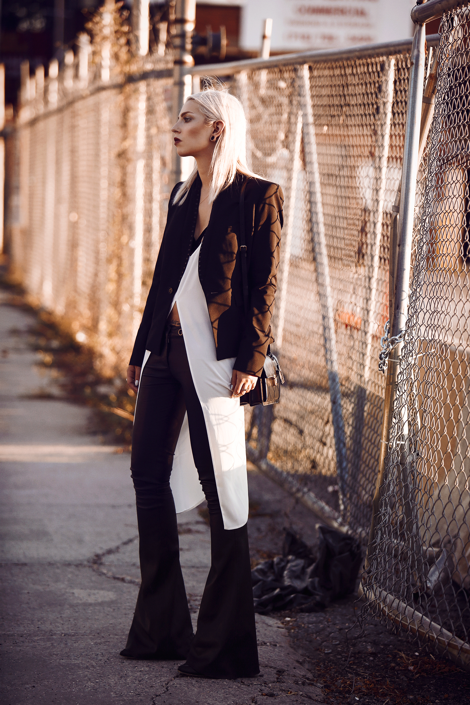 Street style from New York, Williamsburg with Manhattan Skyline via Masha Sedgwick wearing Diesel Black Gold and Saint Laurent