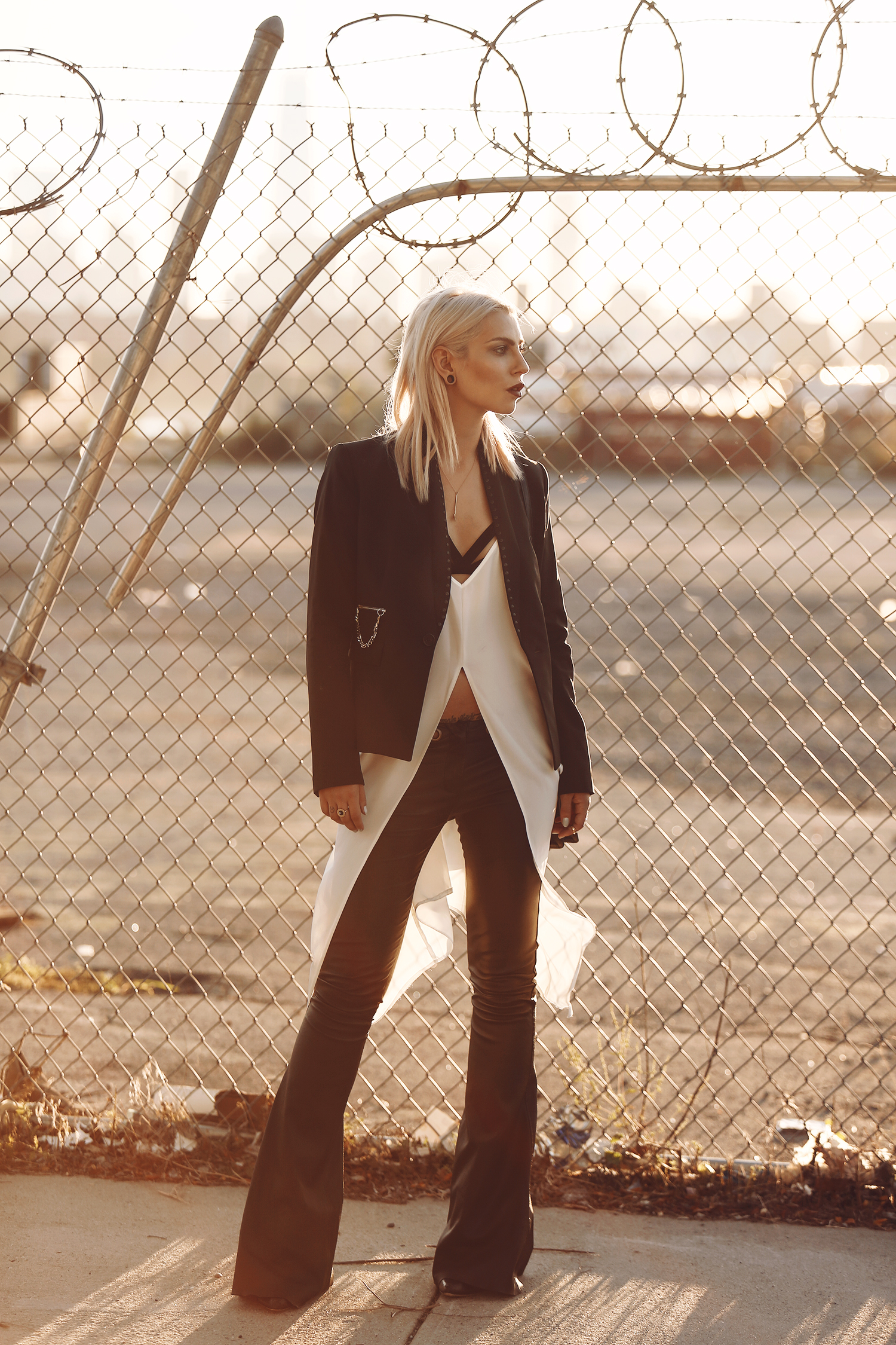 Street style from New York, Williamsburg with Manhattan Skyline via Masha Sedgwick wearing Diesel Black Gold and Saint Laurent