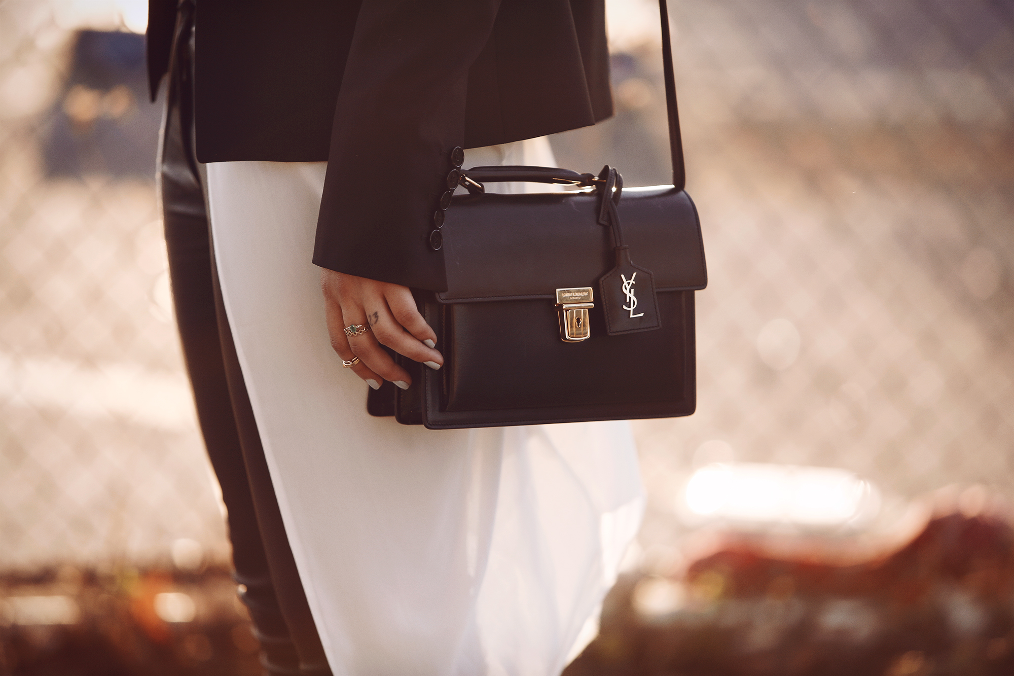 Street style from New York, Williamsburg with Manhattan Skyline via Masha Sedgwick wearing Diesel Black Gold and Saint Laurent