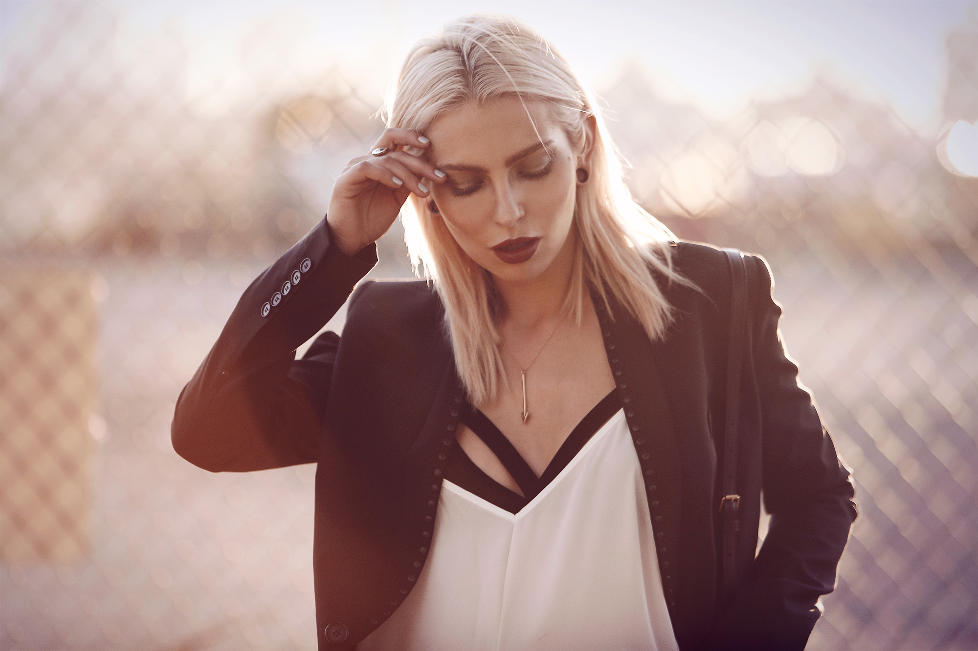 Street style from New York, Williamsburg with Manhattan Skyline via Masha Sedgwick wearing Diesel Black Gold and Saint Laurent