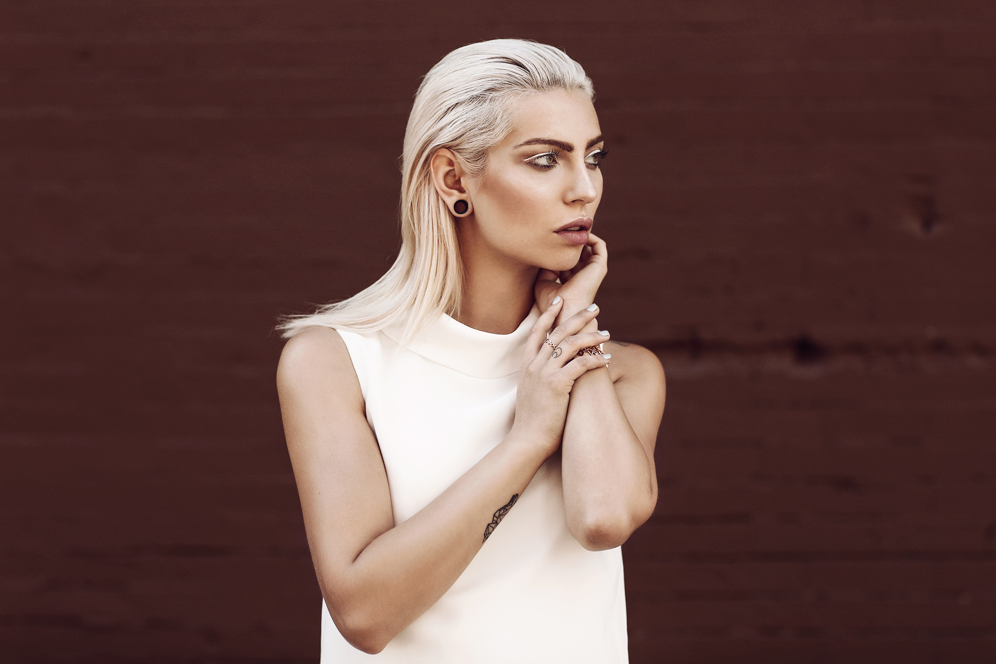 Masha Sedgwick | Portrait | platin blonde hair styles: sleek, braided, bun