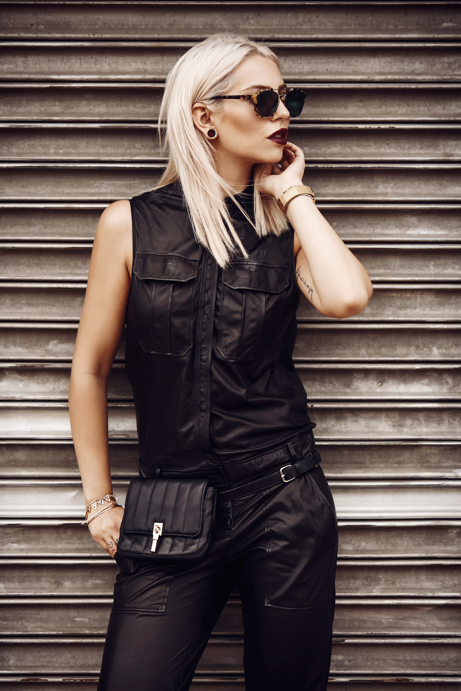 #NYFW - the leather jumpsuit | my street style from New York | Masha Sedgwick is wearing a leather jumpsuit, a belt bag and sunnies from Dior