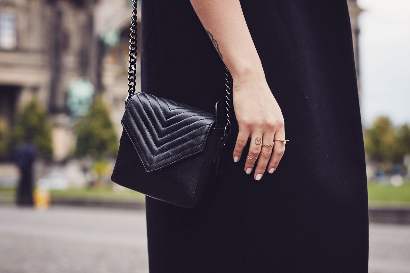 My elegant outfit wearing a leather dress from Mulberry, a vest from Dimitri and Sergio Rossi Heels | This outfit was shot in Berlin in front of the 