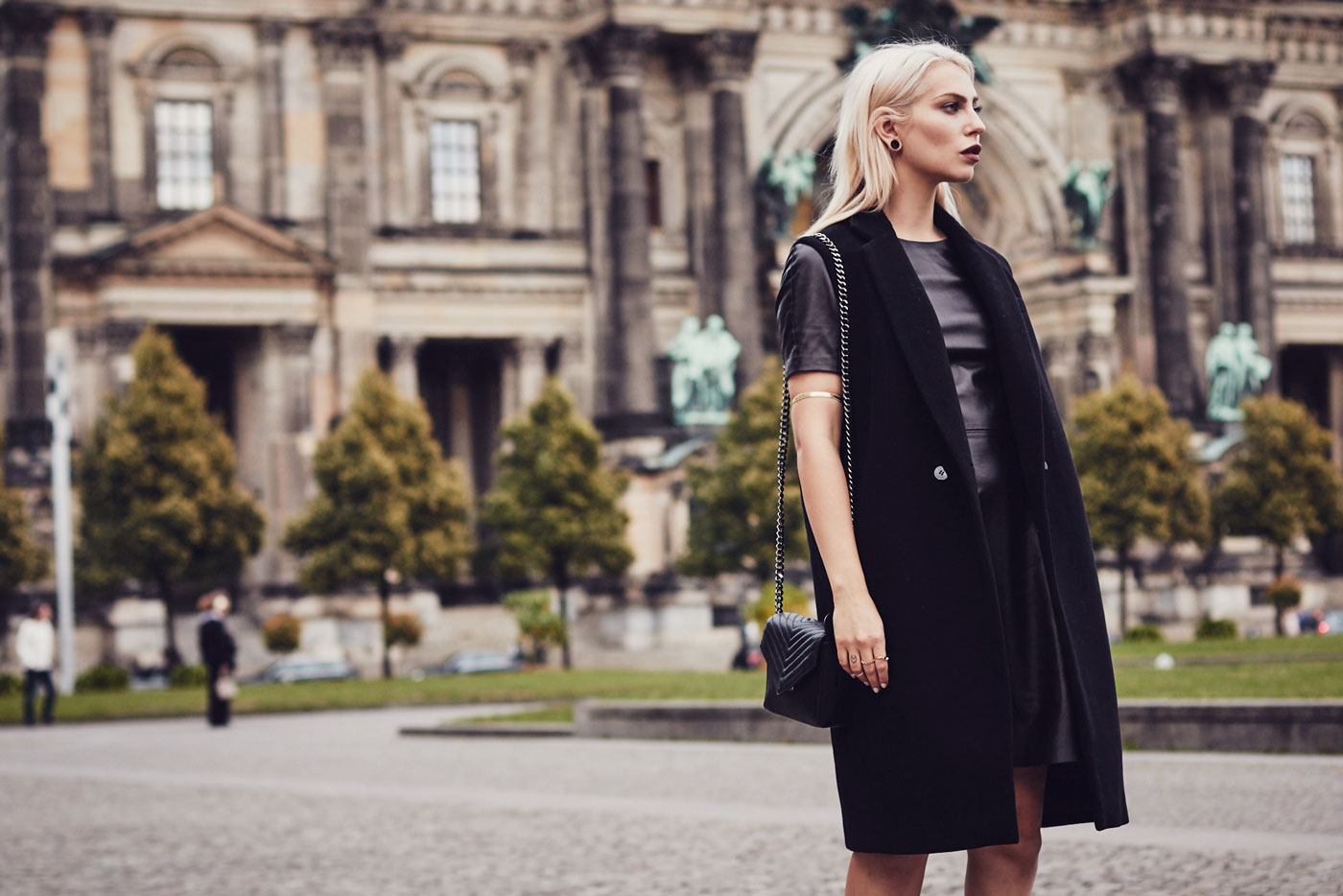 My elegant outfit wearing a leather dress from Mulberry, a vest from Dimitri and Sergio Rossi Heels | This outfit was shot in Berlin in front of the 