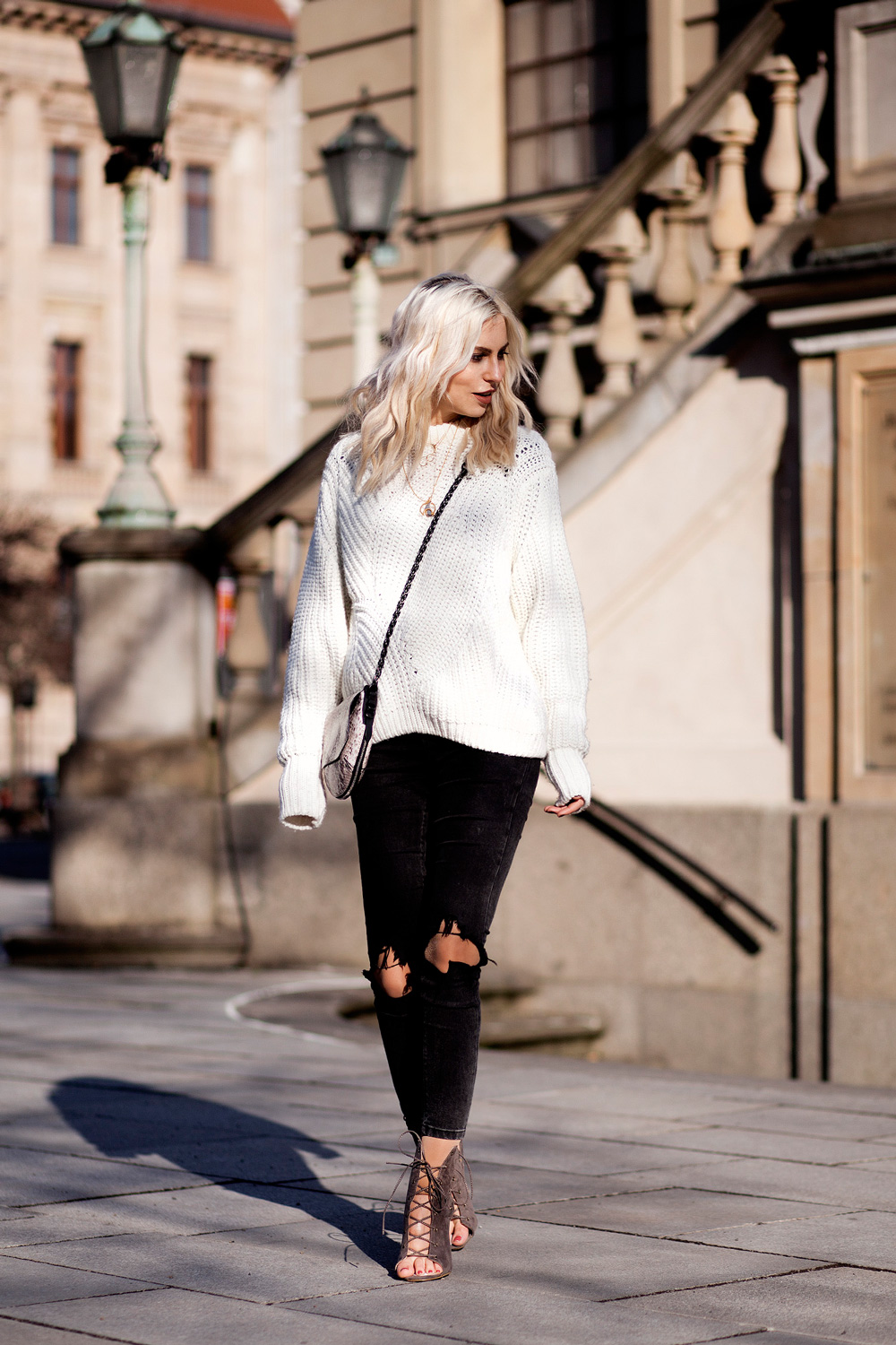 view the full outfit on my blog | lace up boots from Missguided | black jeans | white sweater (knitwear) | snake bag from rag & bone | winter style taken in Berlin