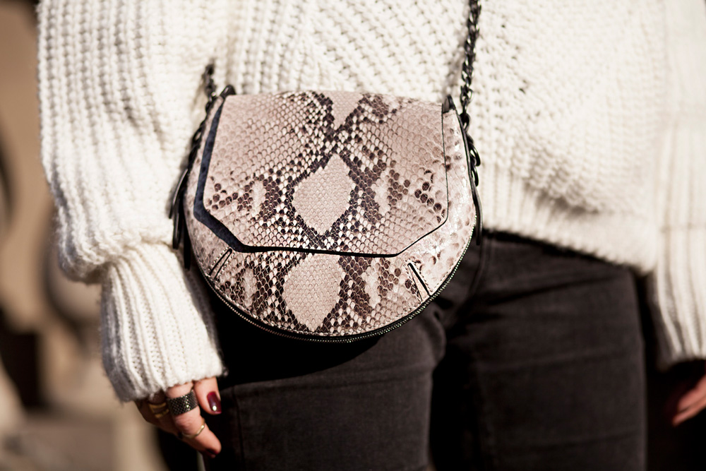view the full outfit on my blog | lace up boots from Missguided | black jeans | white sweater (knitwear) | snake bag from rag & bone | winter style taken in Berlin