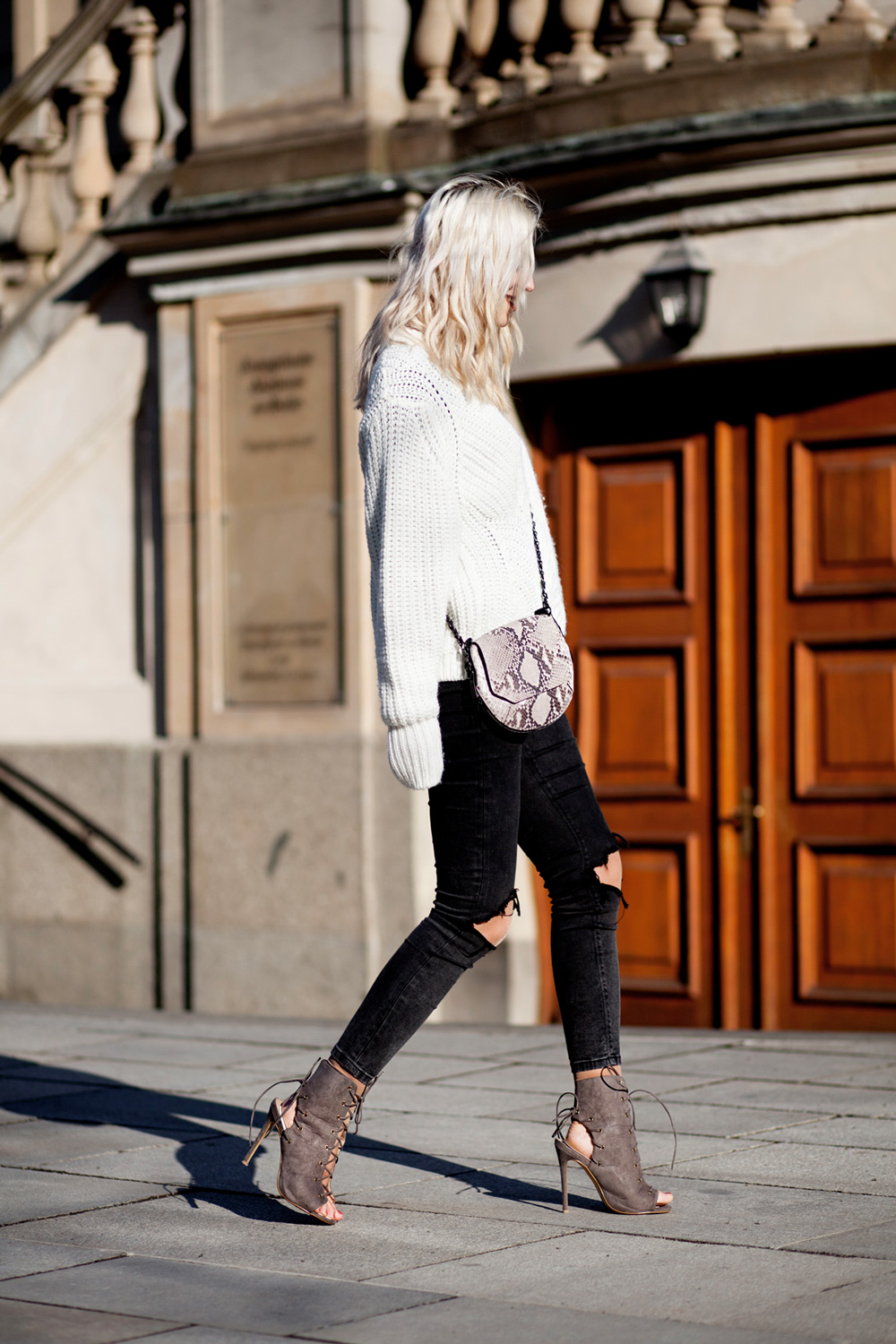 view the full outfit on my blog | lace up boots from Missguided | black jeans | white sweater (knitwear) | snake bag from rag & bone | winter style taken in Berlin