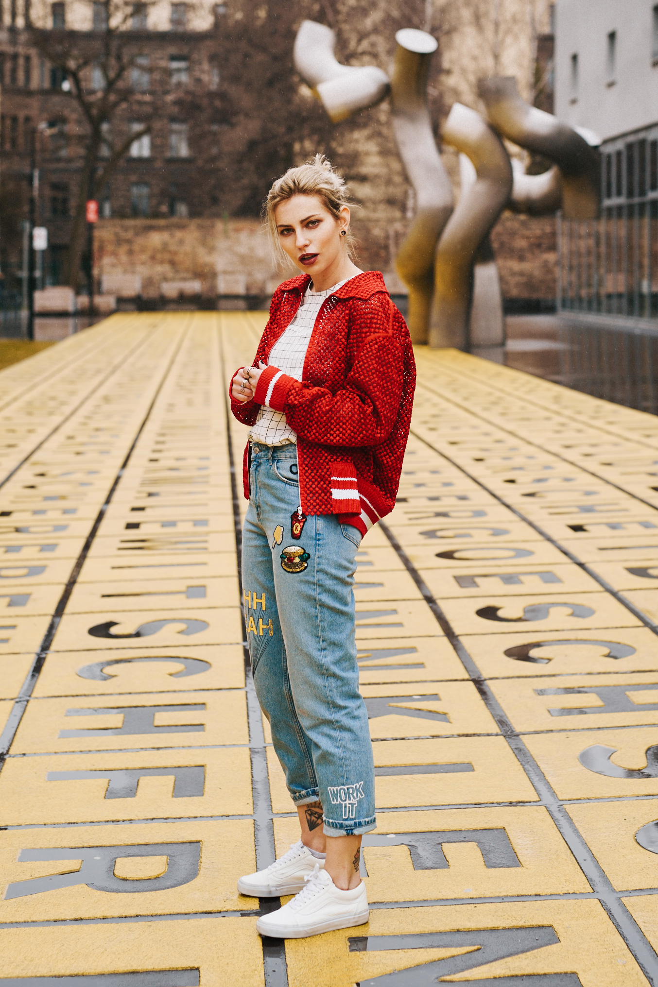 sporty and playful style | view more details on my blog | red bomber jacket from Gauchère, jeans with patches from Zara, white Vans sneakers | fashion and street style | Berlin