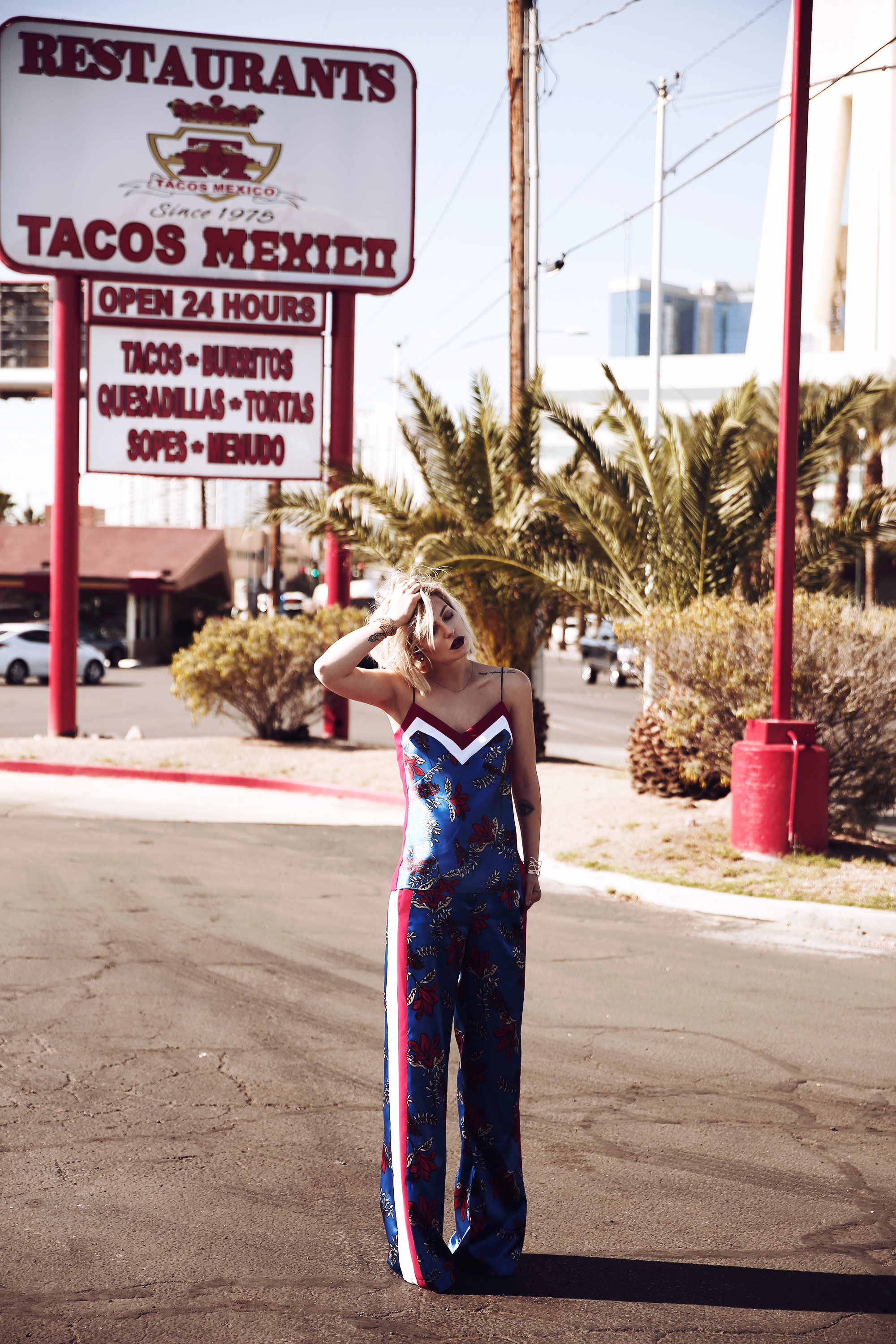 the crazy two piece from Pinko | view more pictures on my blog | it's a mix of flower print, sporty stripes and colors | taken in Las Vegas | pure silk | editorial | fashion | style