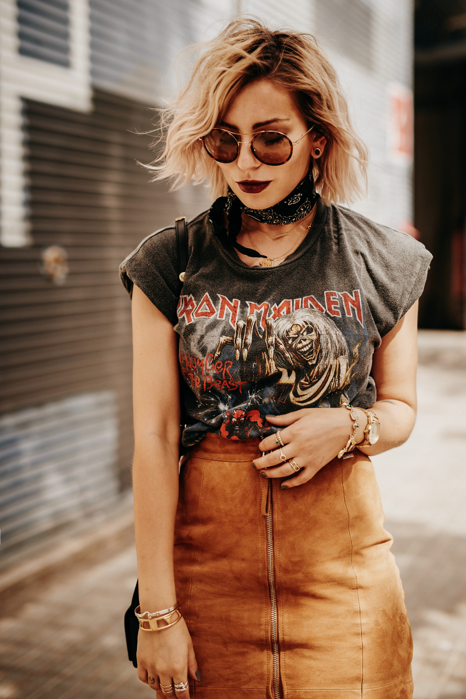 Street style taken in Barcelona, Spain | Masha Sedgwick is wearing a vintage Iron Maiden band shirt, a brown suede pencil skirt, lace up high heels from Elisabetta Franchi and round sunnies from Gucci | find more pictures and fashion & beauty topics on my blog