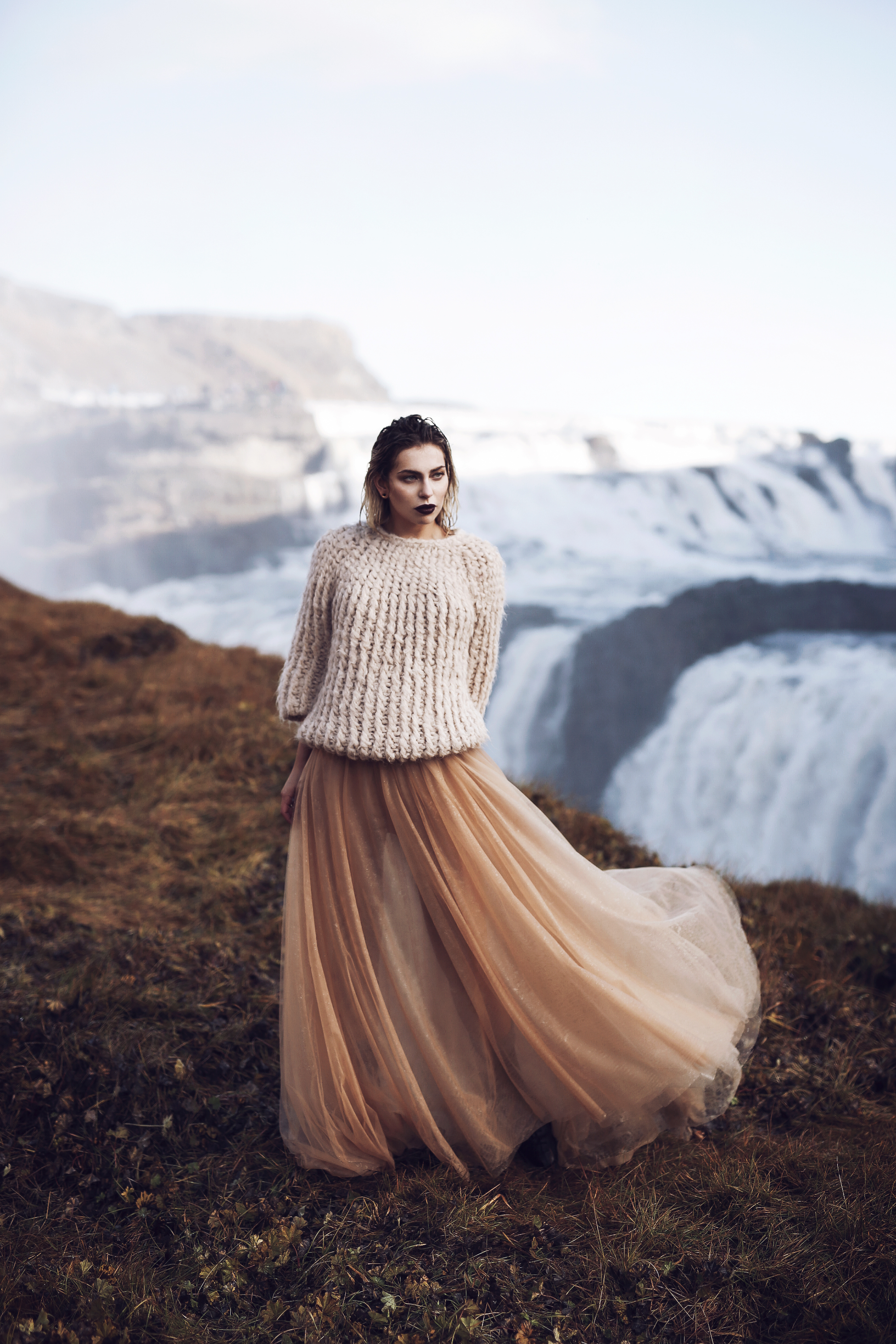 Waterfall in Iceland | Editorial Fashion Shooting for mybestbrands | style: feminine, melancholic, winter princess