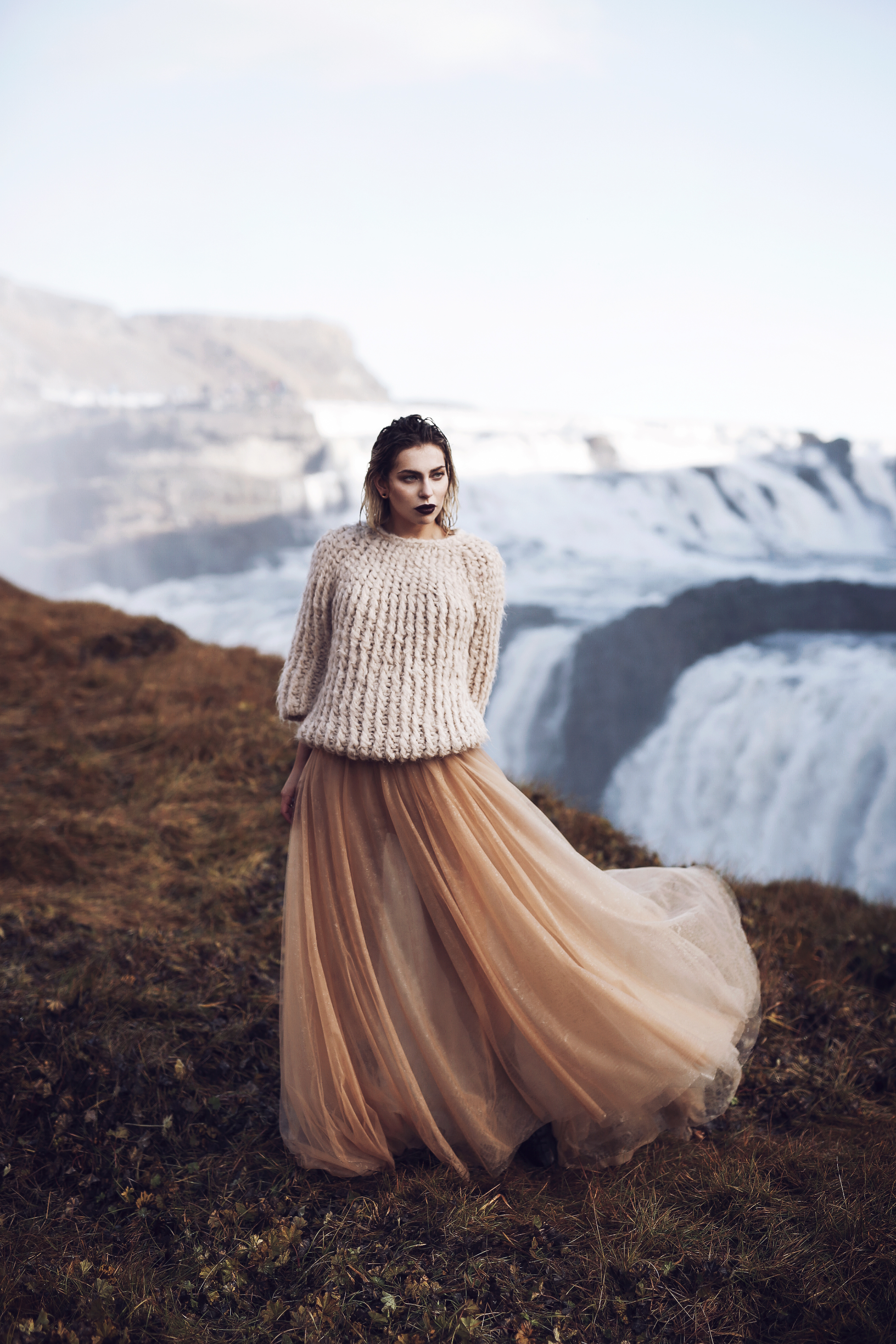 Waterfall in Iceland | Editorial Fashion Shooting for mybestbrands | style: feminine, melancholic, winter princess