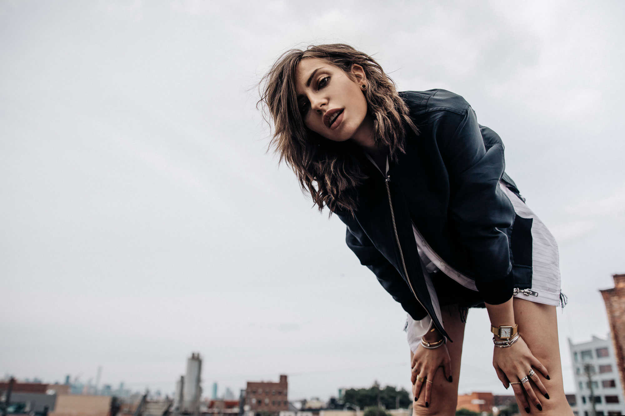 shooting on a rooftop in Brooklyn, NYC | New York | fashion | Editorial | Style | blogger Masha Sedgwick | products: Adriana Metallic Sneakers from Acne Studios, bomber jacket from 3.1 Phillip Lim, black denim skirt from  Levi's | photos: Theresa Kaindl | topic: Random Facts | edgy, sexy, sporty, grunge, cool, casual