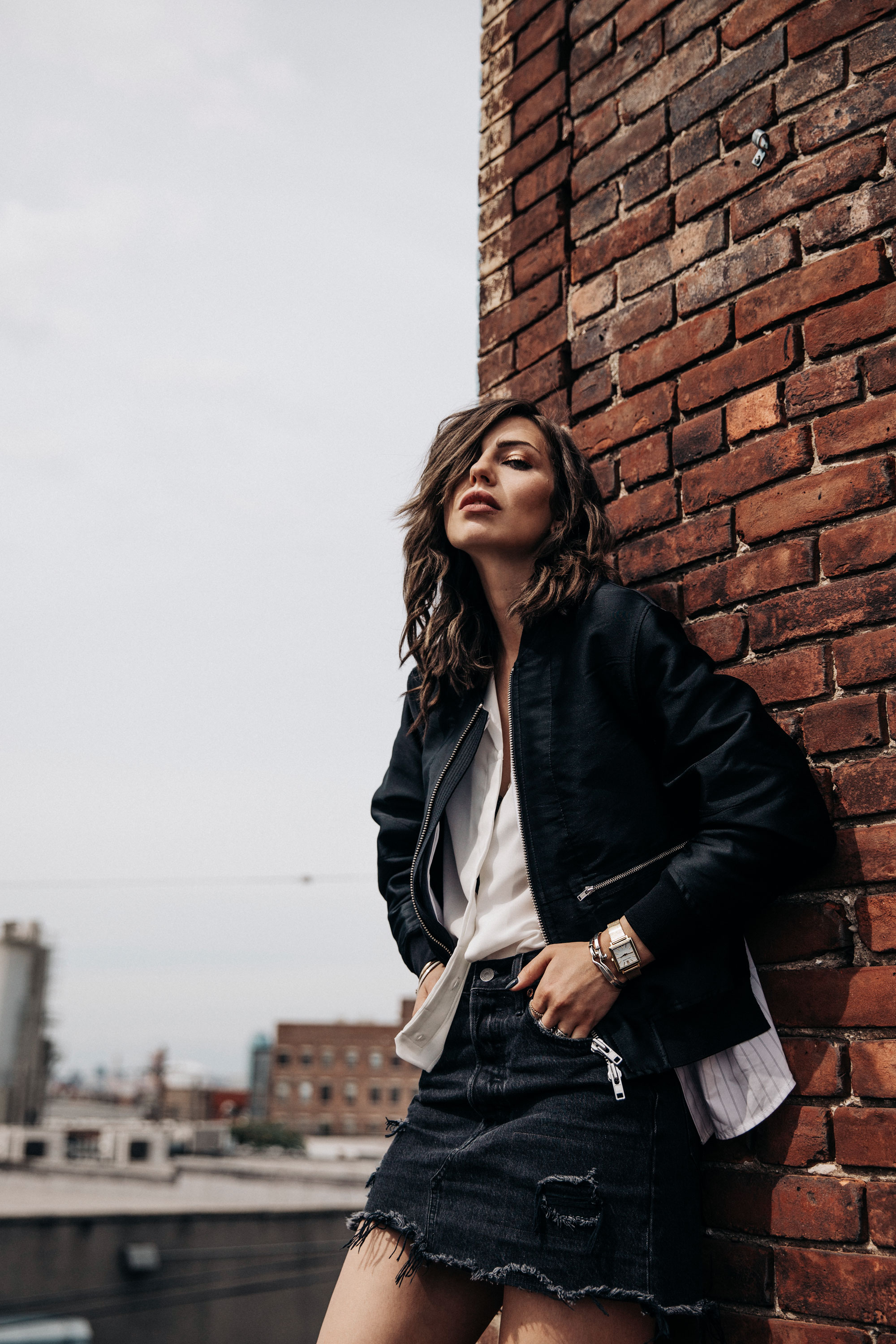 shooting on a rooftop in Brooklyn, NYC | New York | fashion | Editorial | Style | blogger Masha Sedgwick | products: Adriana Metallic Sneakers from Acne Studios, bomber jacket from 3.1 Phillip Lim, black denim skirt from  Levi's | photos: Theresa Kaindl | topic: Random Facts | edgy, sexy, sporty, grunge, cool, casual