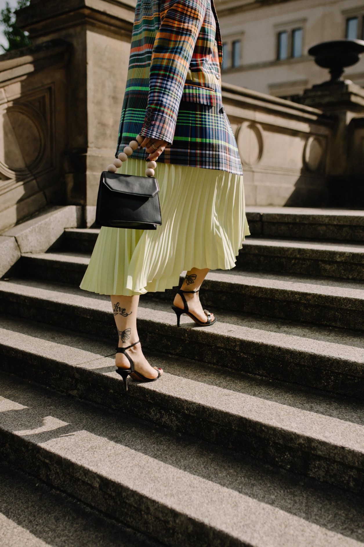 Streetstyle by Masha Sedgwick | Fashion blogger from Berlin, Germany Editorial Photography, make up, hair & beauty inspiration, daily outfit inspiration, best of ootd, lotd, look of the day, portrait photography, summer fashion trends 2019 | Style: sexy, edgy, chic, Scandinavian, minimalistic, effortless cool | outfit: neon green skirt by Artet, Dries van Noten Rainbow blazer, topshop bag, fine jewelry | Berlin Museumsinsel Shooting location