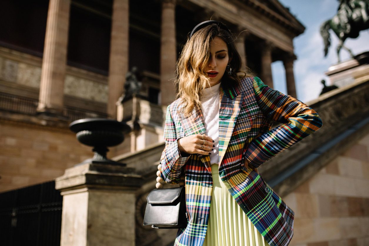 Streetstyle by Masha Sedgwick | Fashion blogger from Berlin, Germany Editorial Photography, make up, hair & beauty inspiration, daily outfit inspiration, best of ootd, lotd, look of the day, portrait photography, summer fashion trends 2019 | Style: sexy, edgy, chic, Scandinavian, minimalistic, effortless cool | outfit: neon green skirt by Artet, Dries van Noten Rainbow blazer, topshop bag, fine jewelry | Berlin Museumsinsel Shooting location