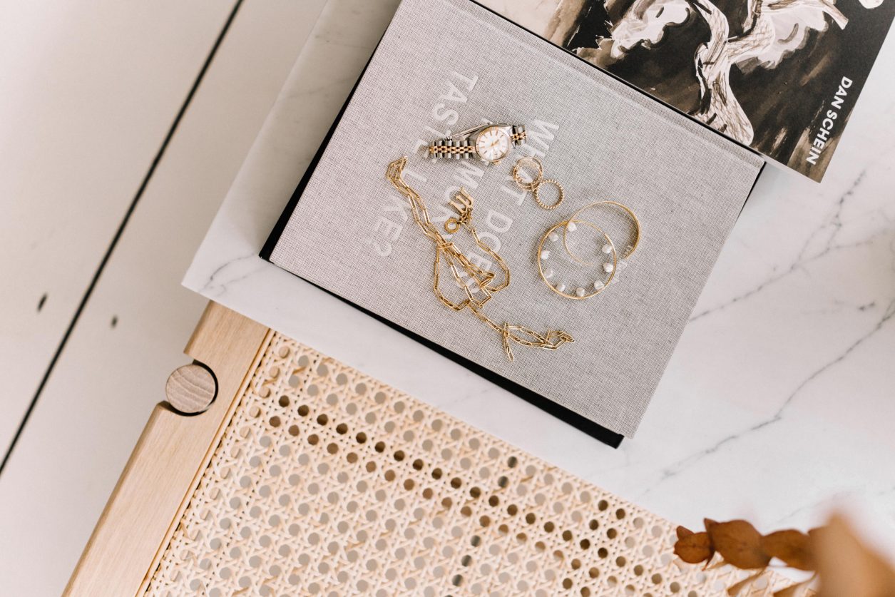 Masha Sedgwick at the CPHFW SS20 wearing black leather shirt by Gestuz, Maria Black jewelry (pearl earring and rings), Thomas Sabo necklace, Rolex watch, belt bag by Jil Sander