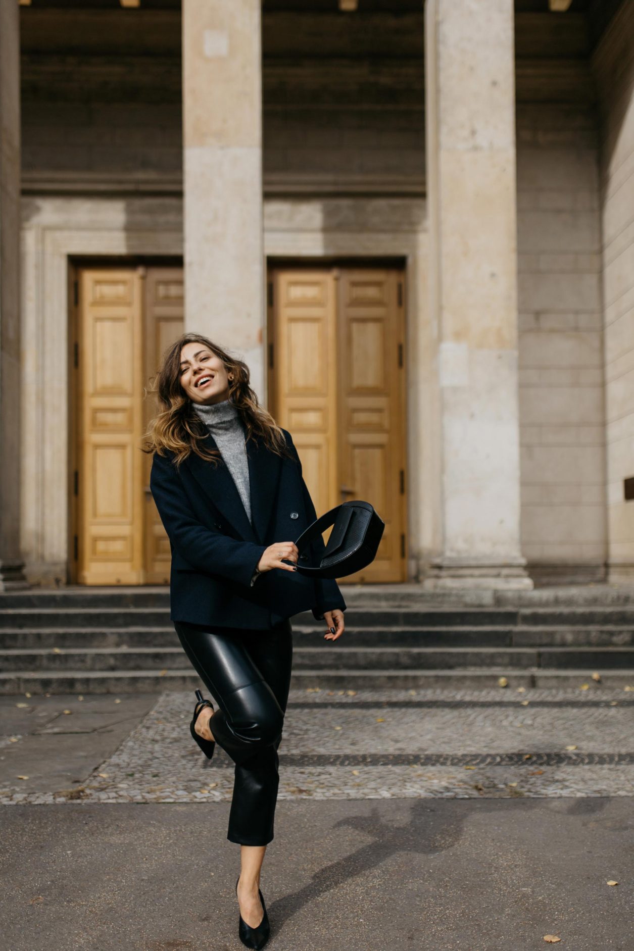 AW19 Streetstyle by Masha Sedgwick, wearing Leather Pants: Nanushka
Knit: Gestuz
Jacket: Samsoe Samsoe
Bag: Lili Radu 
Slingbacks: Charles Keith