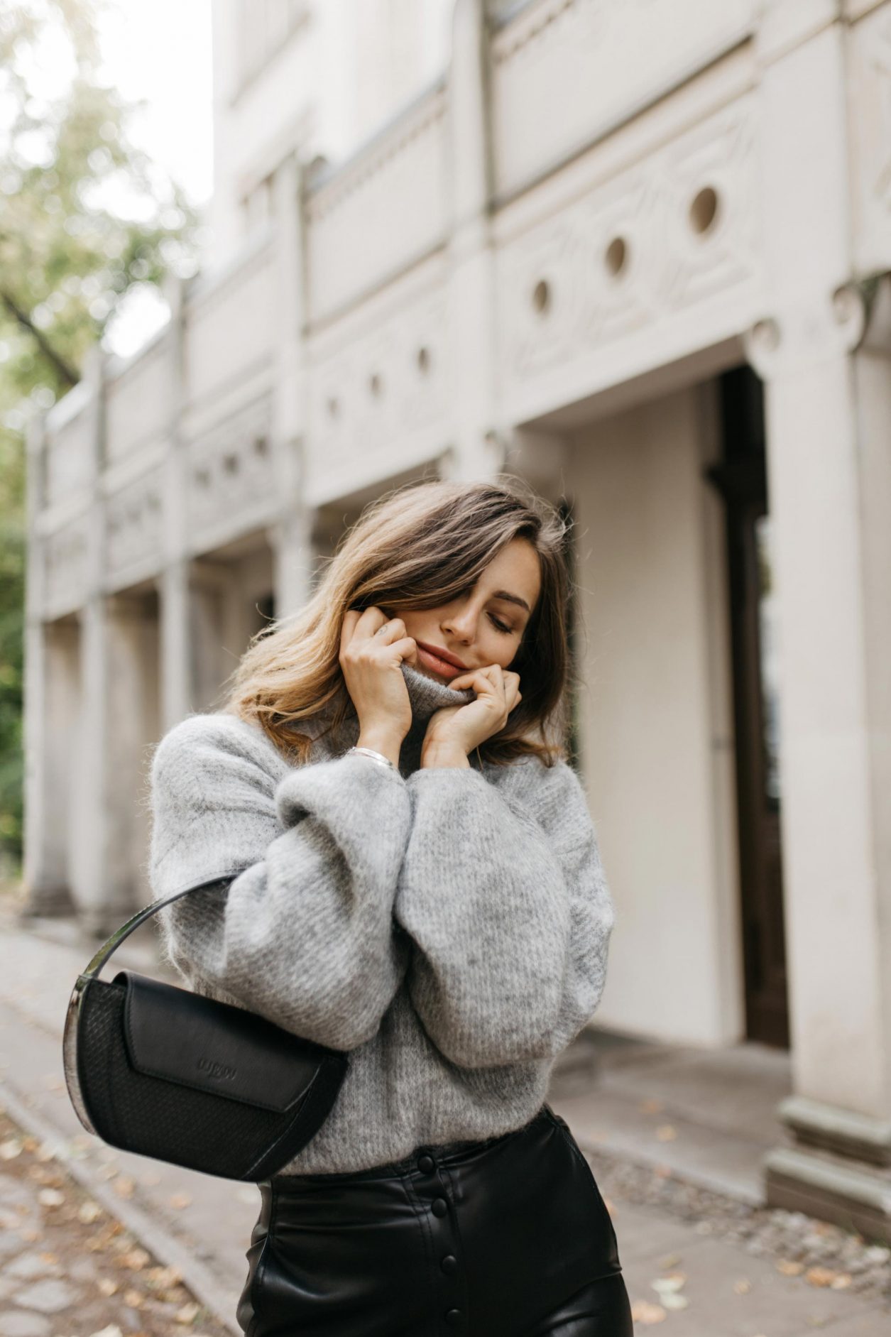 AW19 Streetstyle by Masha Sedgwick, wearing Leather Pants: Nanushka
Knit: Gestuz
Jacket: Samsoe Samsoe
Bag: Lili Radu 
Slingbacks: Charles Keith