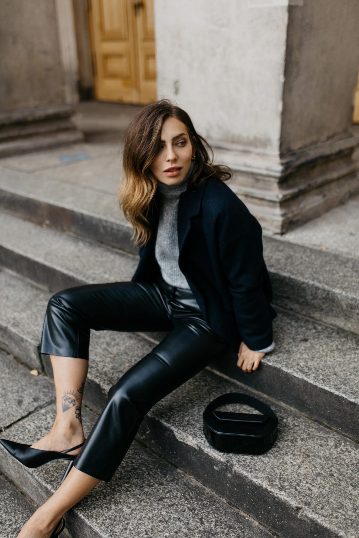 AW19 Streetstyle by Masha Sedgwick, wearing Leather Pants: Nanushka
Knit: Gestuz
Jacket: Samsoe Samsoe
Bag: Lili Radu 
Slingbacks: Charles Keith