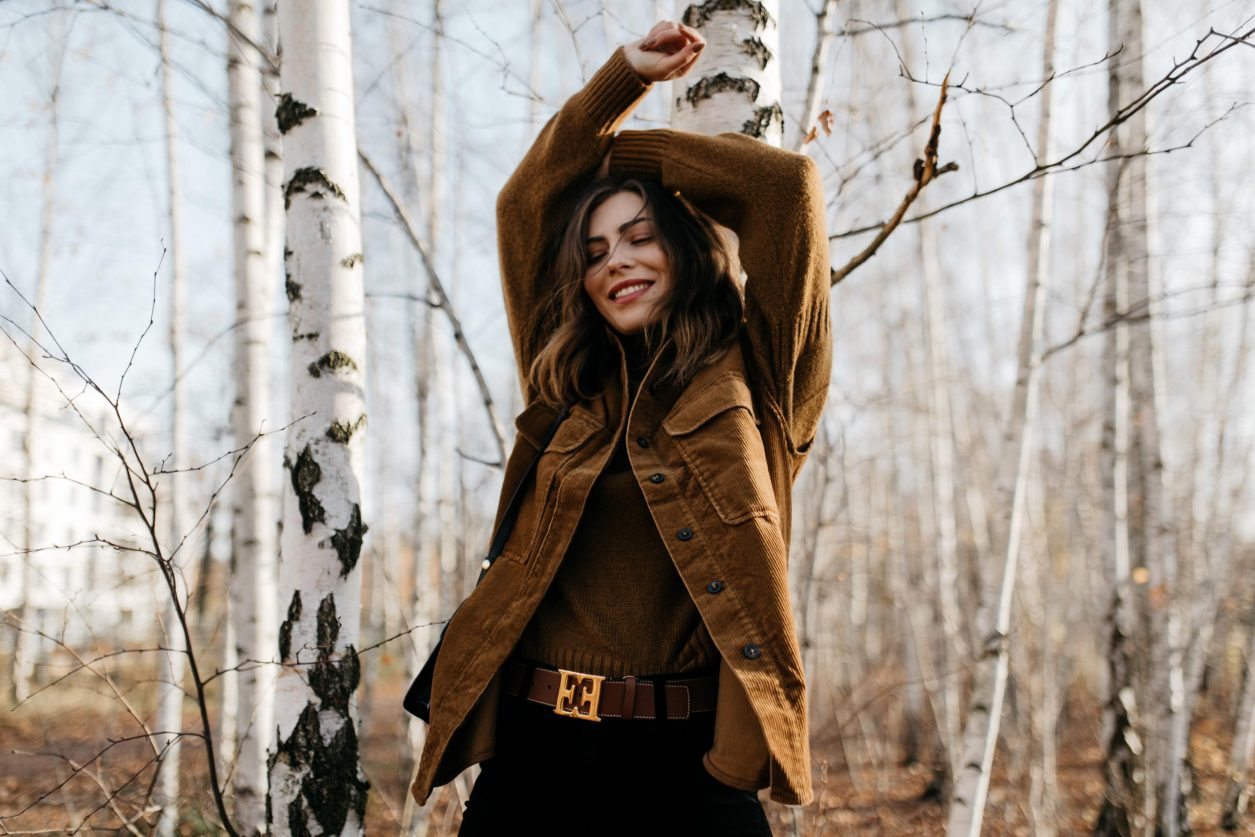 Streetstyle editorial by Masha Sedgwick | Fall winter country style outfit, wearing  tobacco Closed pullover, tobacco cord west by Closed, bootcut jeans by J Brand, brown Escada belt, black black leather cross body bag By Malene Birger | Berlin photo spot: birch park