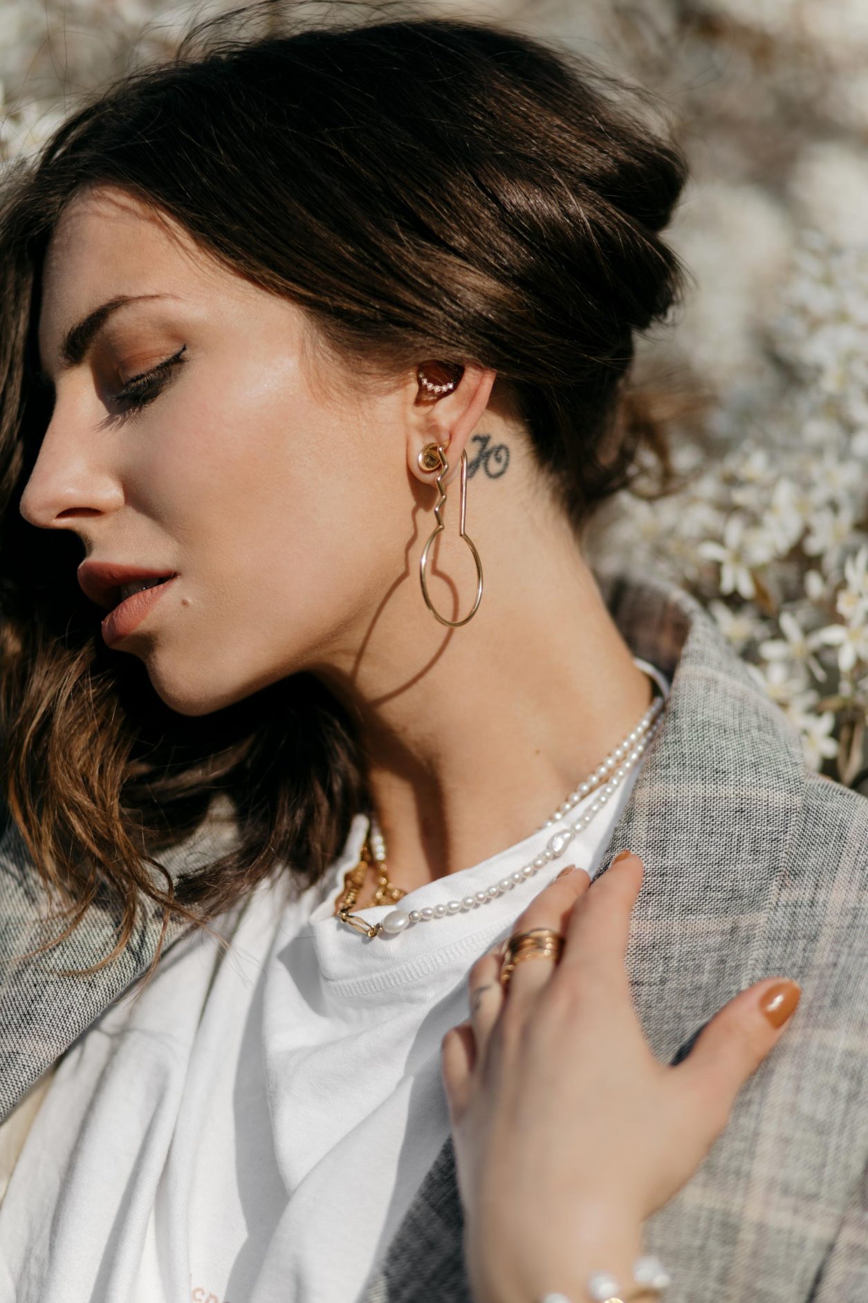 Portrait by Masha Sedgwick | Spring summer jewelry editorial | Wearing large single earring by Maria Black, pearl necklace by Maria Black