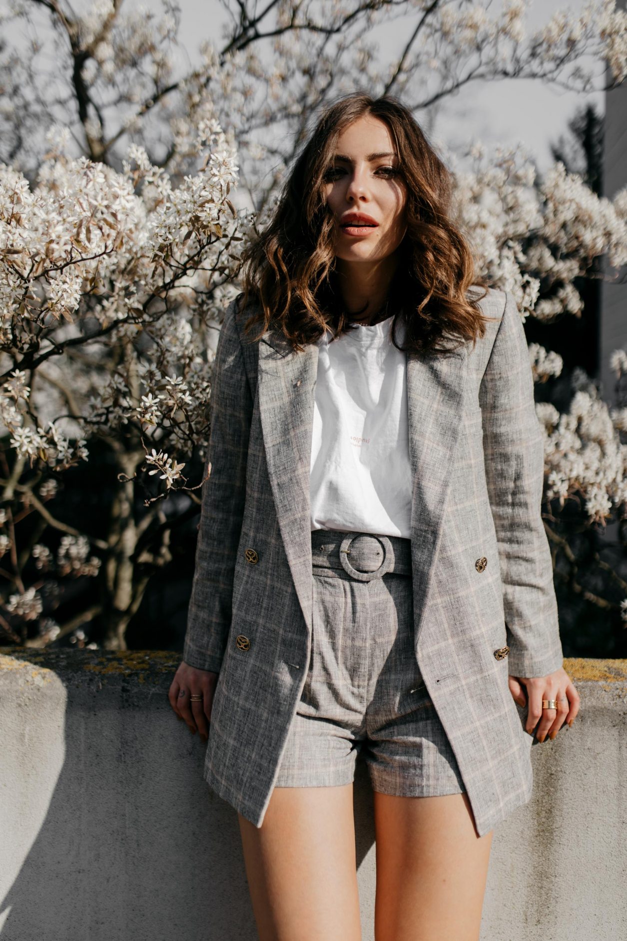Streetstyle by Masha Sedgwick | Spring editorial, summer business suit with pants, outfit inspiration | Wearing linen beige checked shorts suit by Sandro Paris, white basic tee by Acne Studios