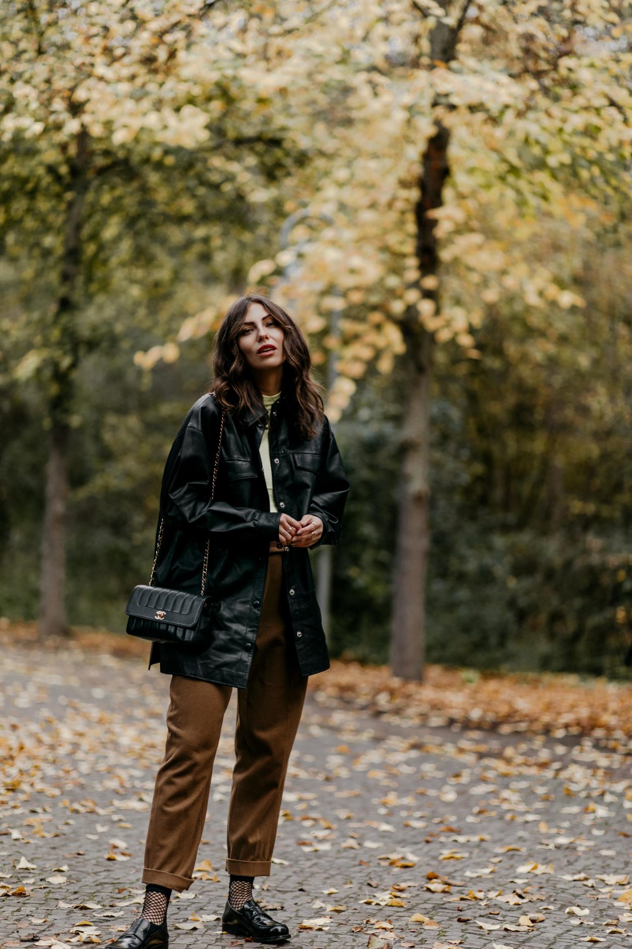 Fashion Blogger Masha Sedgwick | Fall outfit inspiration wearing animal printed zebra Coat: Lala Berlin
Rollneck: Set
Faux Leather Blouse: Gestuz
Pants: Joseph (alt)
Loafer: Maison Margiela
Streetstyle Photographer Tonya Matyu