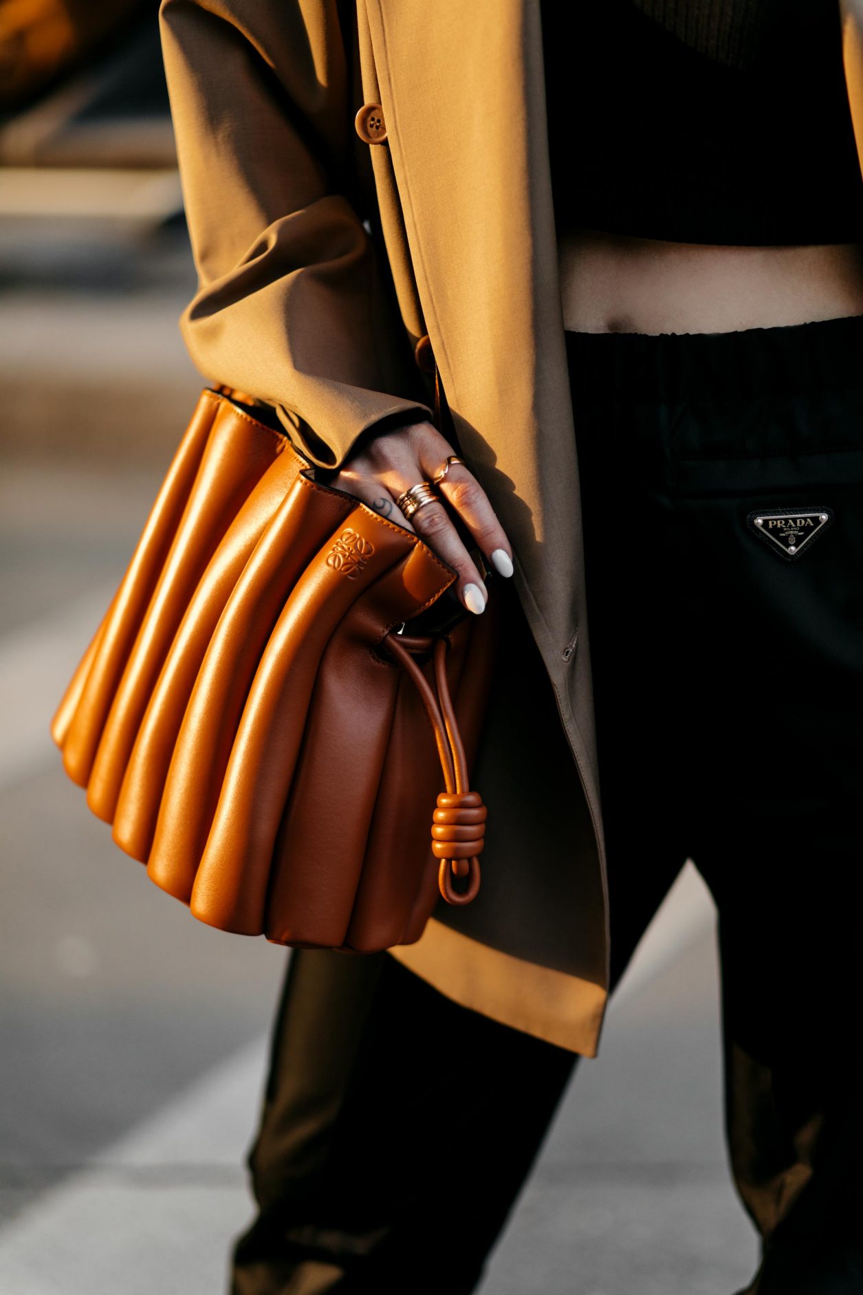 SS21 Streetstyle outfit details: brown oversized Envelope1976 blazer, black crop-top, black recycled nylon pants, Loewe Flamenco Ondas Clutch | Minimalistic ootd, everyday outfit inspiration, styling ideas, effortless cool, high end casual outfit #streetstyle #fashionblogger streetstyle photographer Tonya Matyu